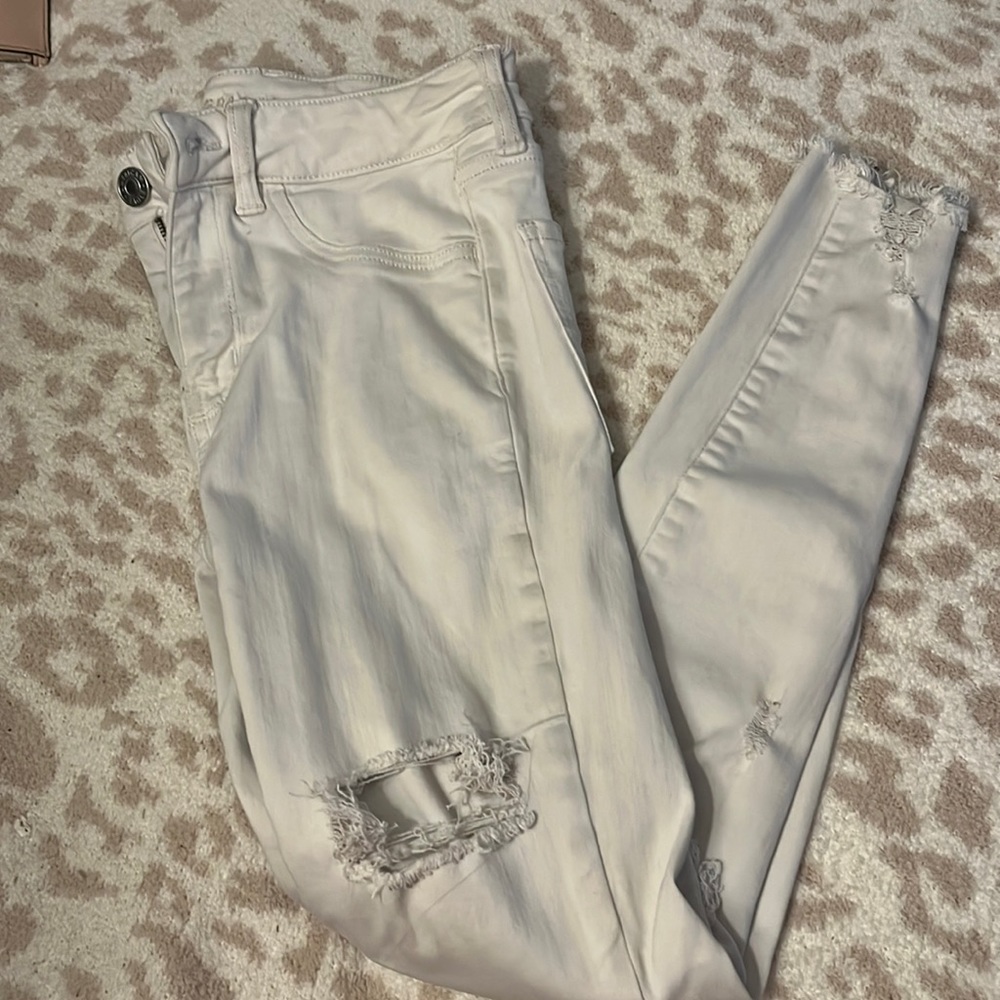 white ripped jeans